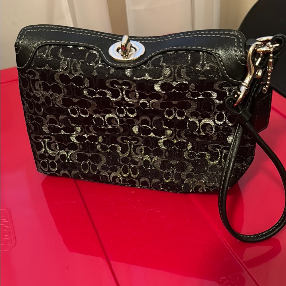 Coach Black and Silver wristlet with Signature Monogram